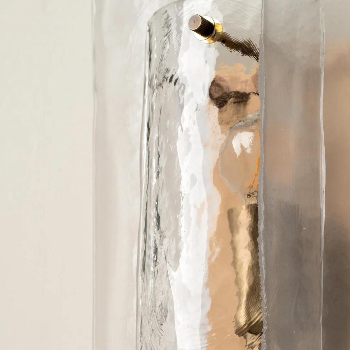 Close view of the layered glass and metal detail