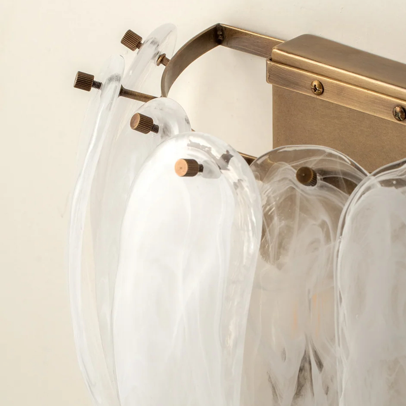 Close-up of metal wall mount and glass detail