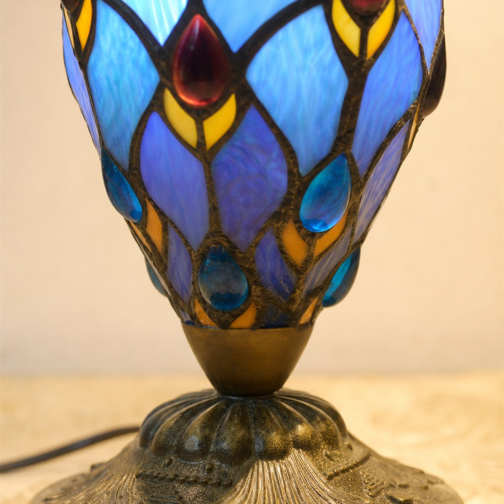 Close view of blue stained glass lamp base detail