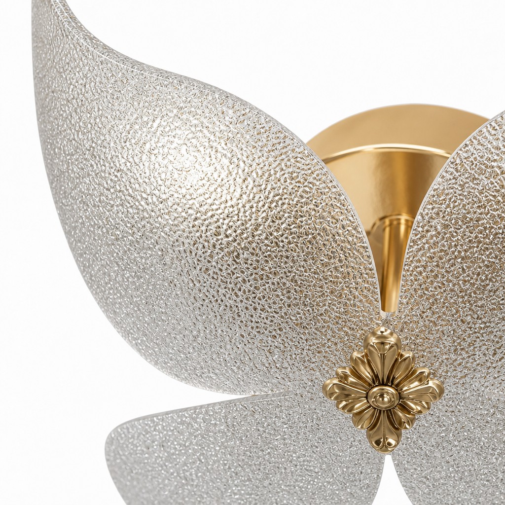 Close-up of frosted acrylic butterfly petals and gold detail