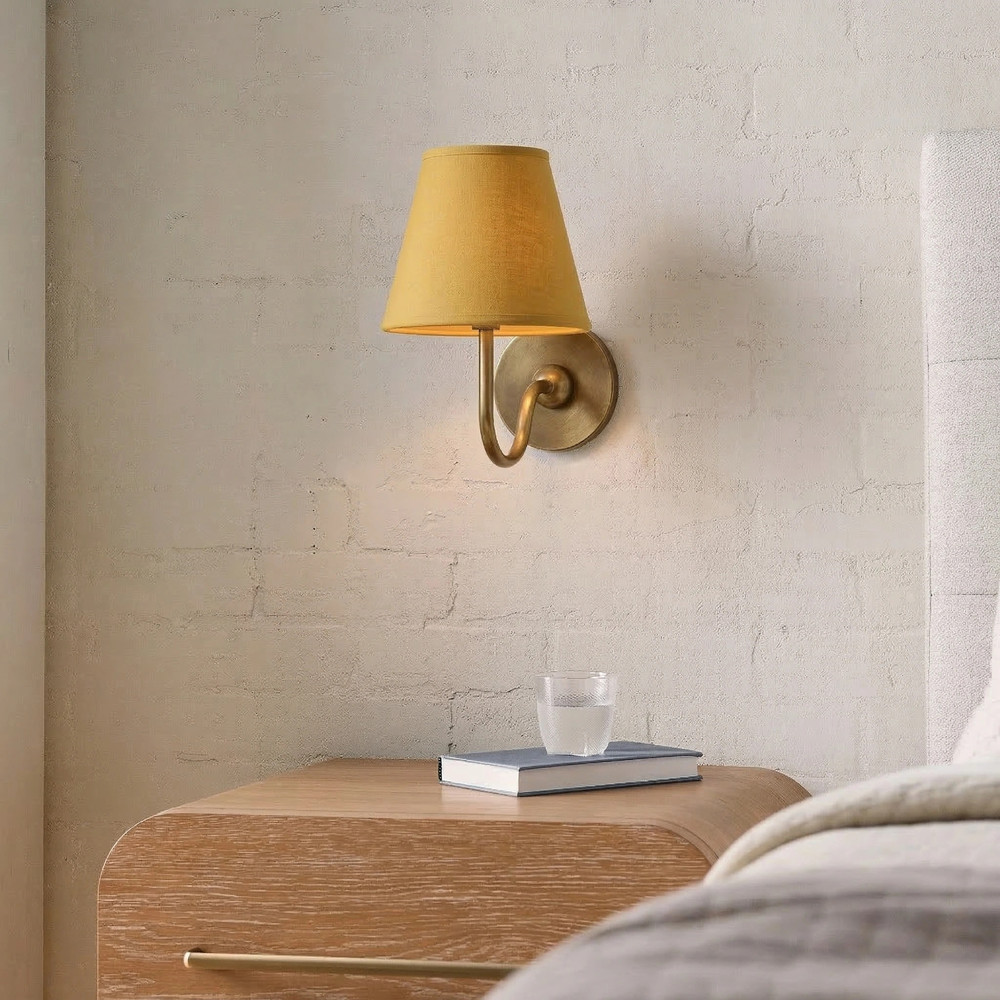 Customer room with yellow Luvora wall lamp shade