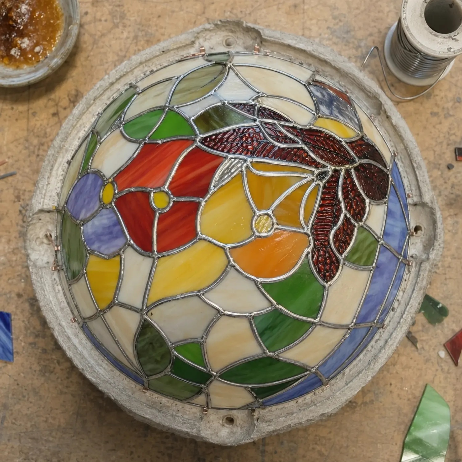 Hand-welded stained glass lamp shade in progress