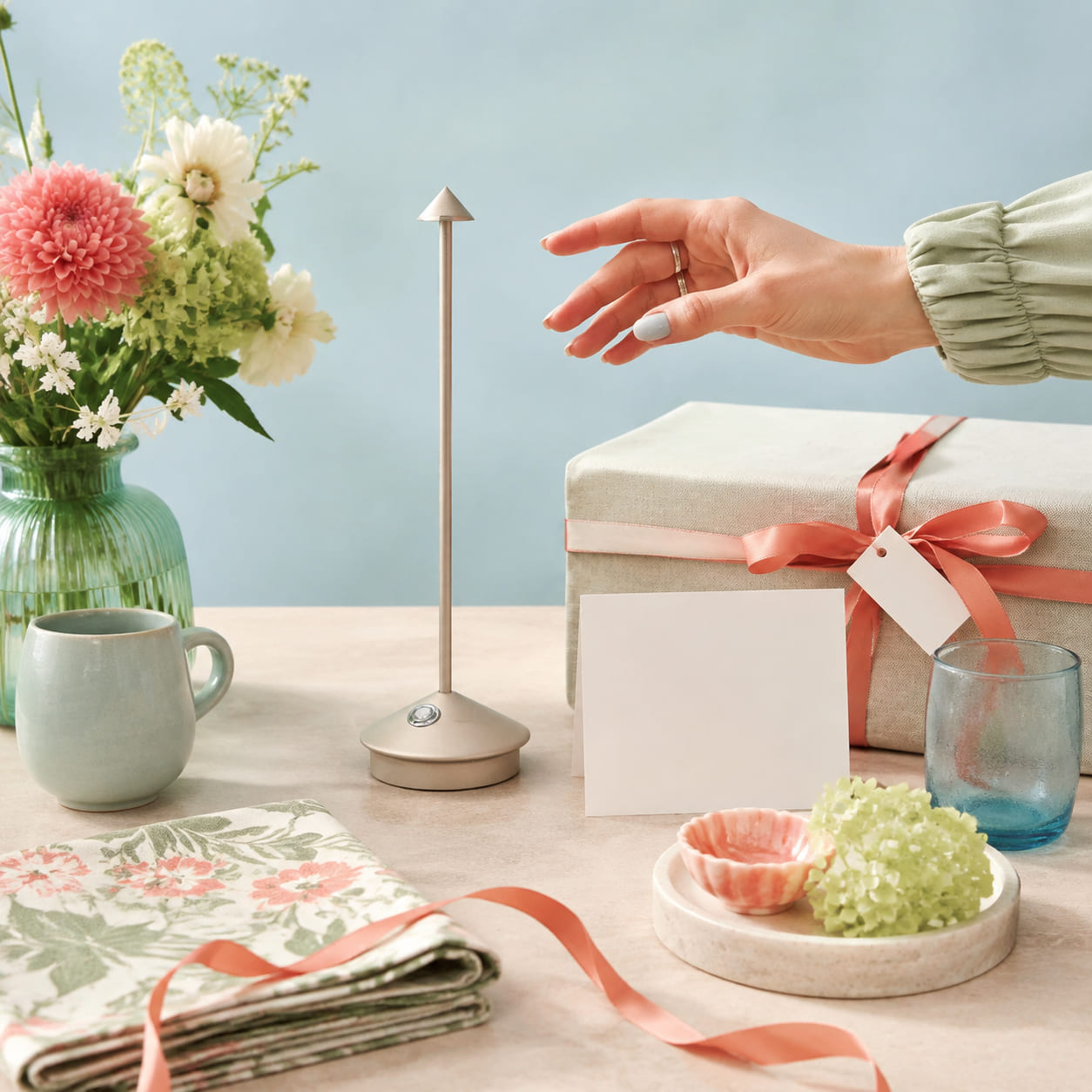 Warm light turns separate gift items into one easy-to-imagine occasion.