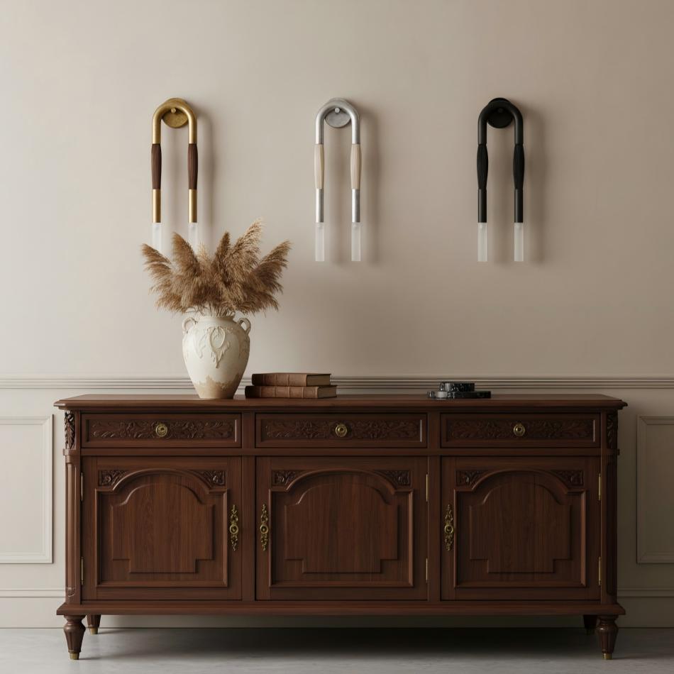 Strandia wall sconces above a wooden cabinet