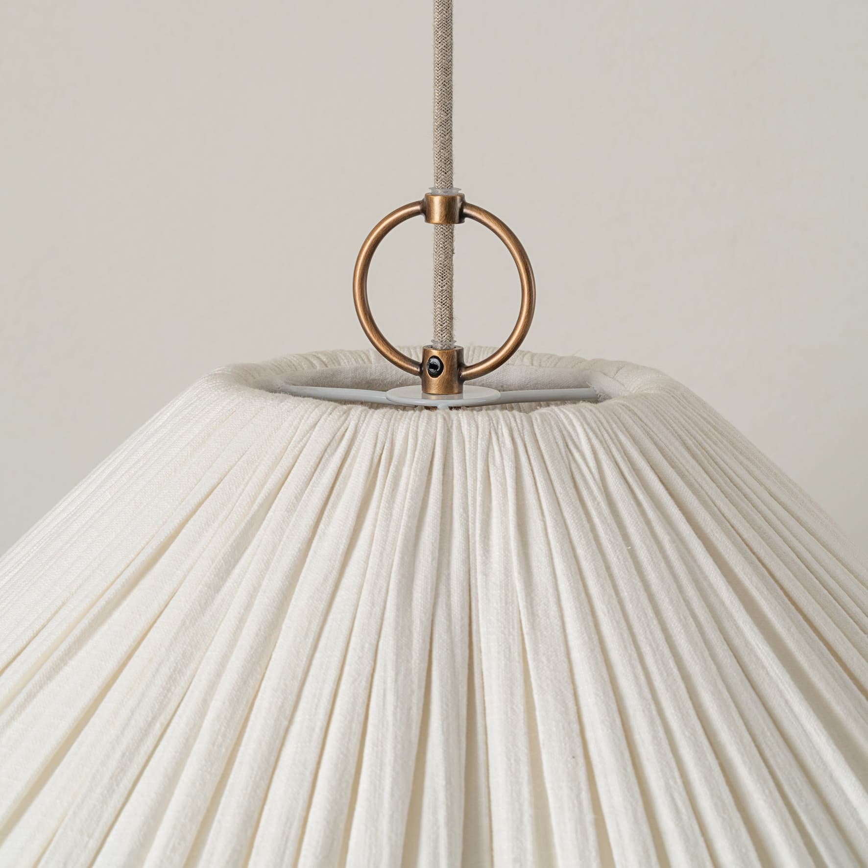 Pendant ring and linen shade detail