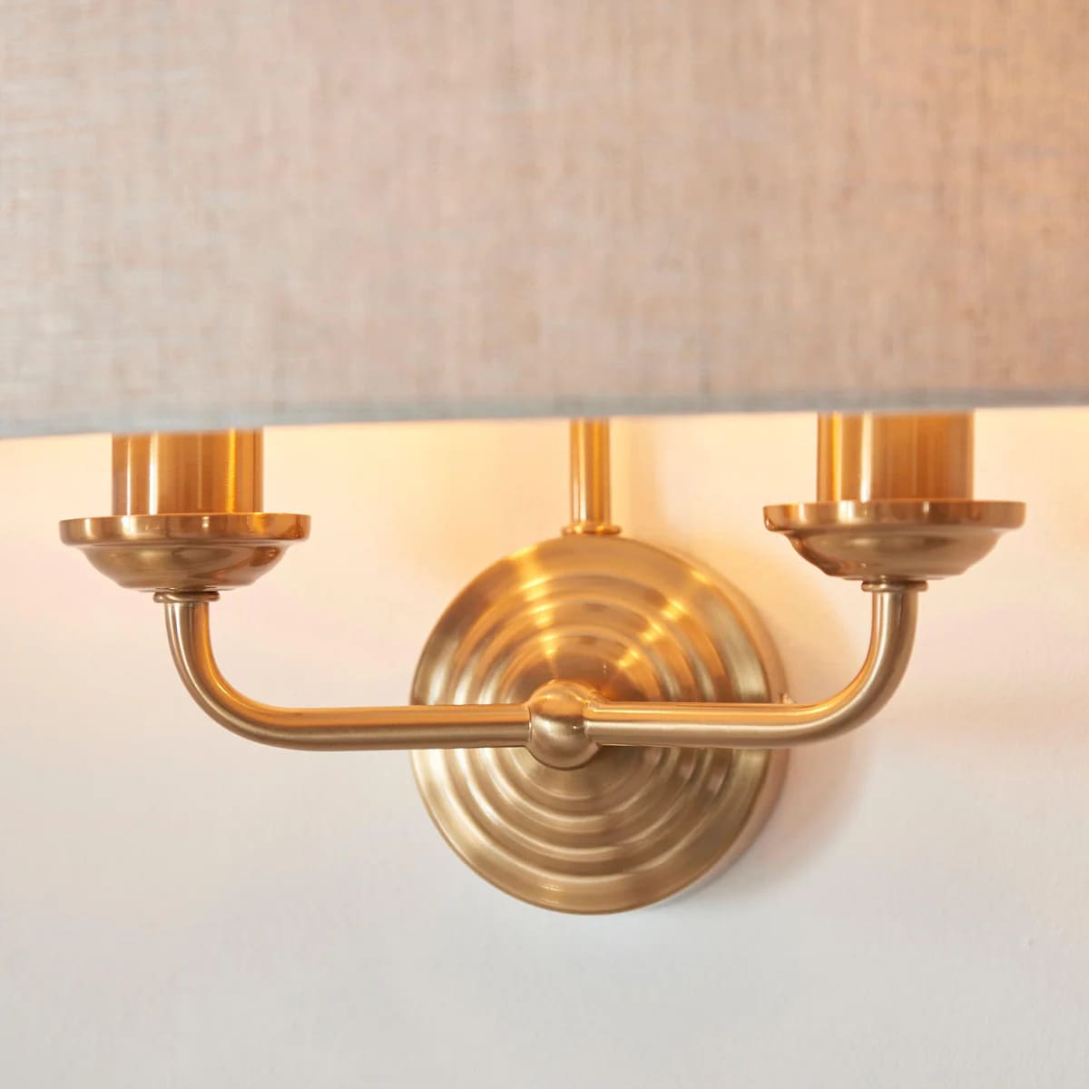 Close look at antique brass Tela wall sconce