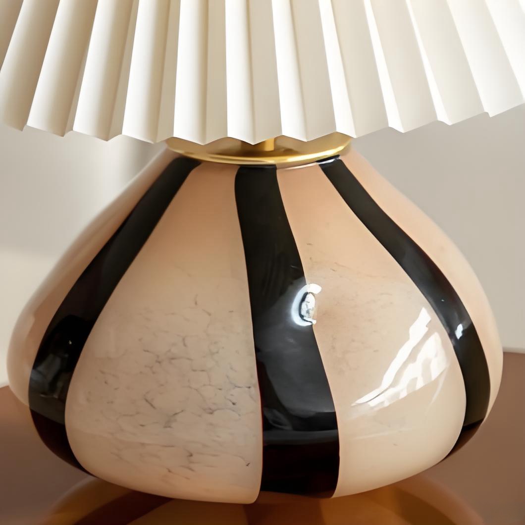 Close-up of the striped glass lamp base