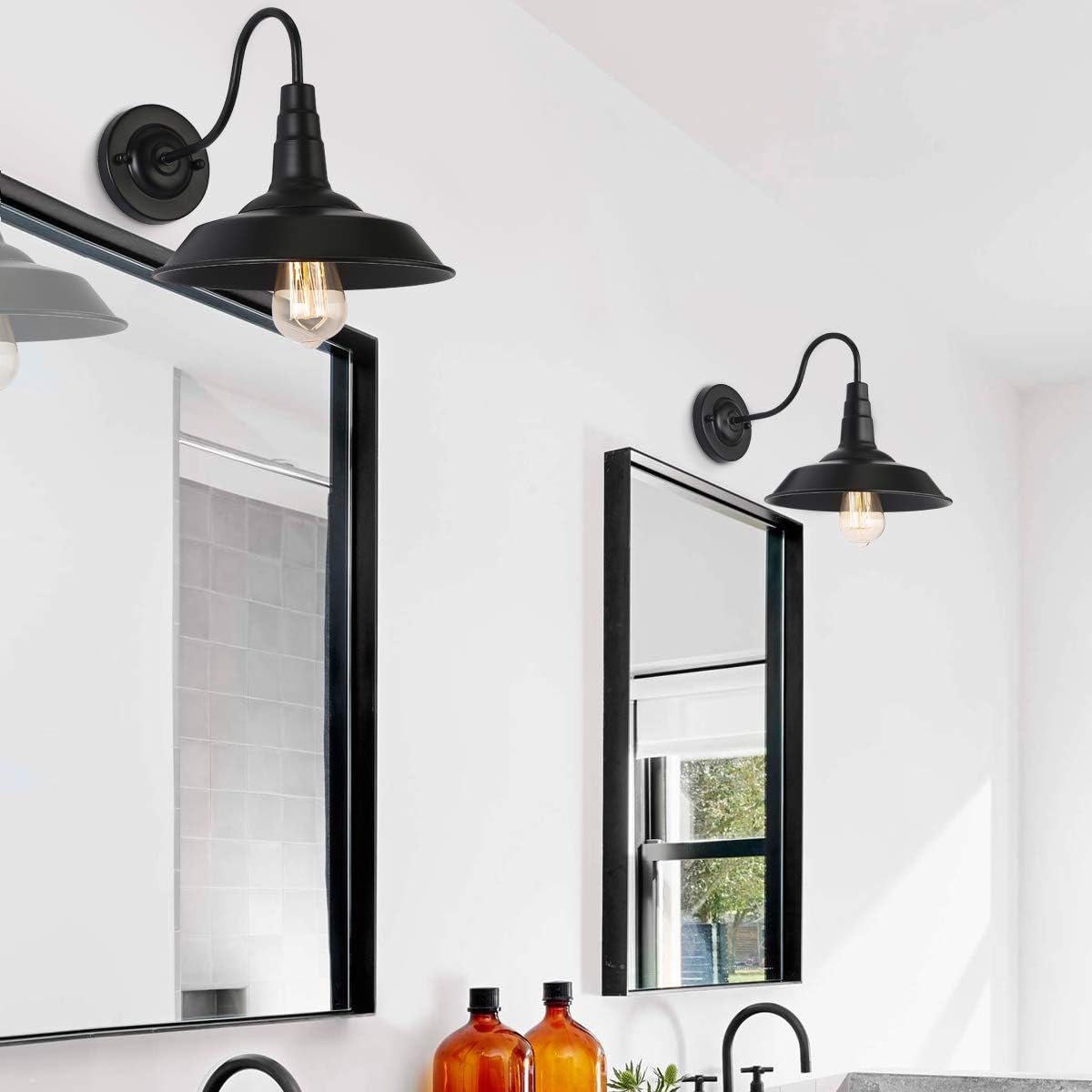 Vintage industrial wall lights installed above bathroom mirrors