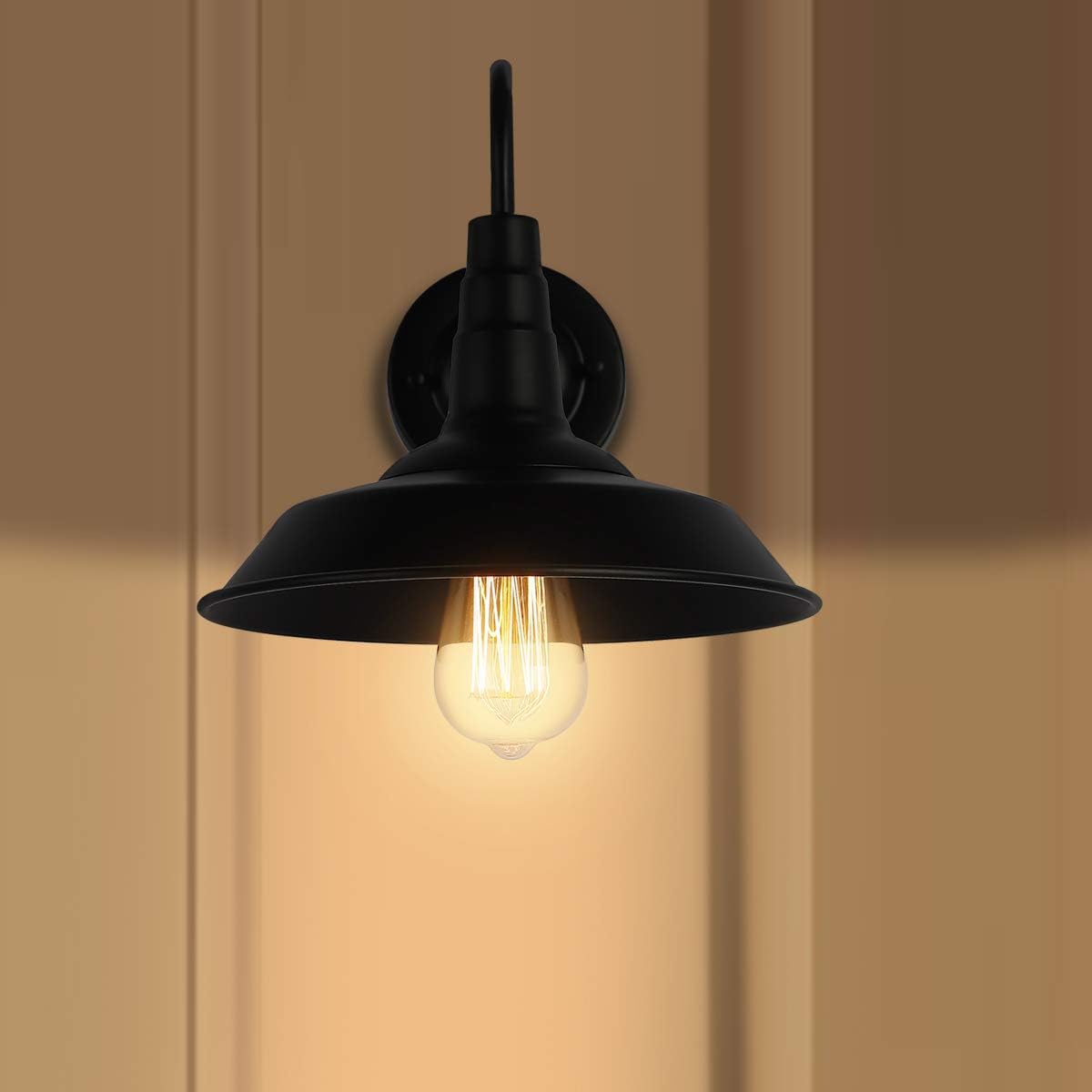 Outdoor wall sconce glowing in a doorway scene