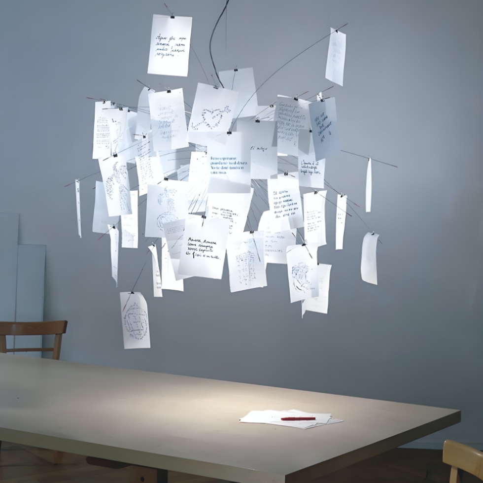 Renee picture pendant light glowing over table