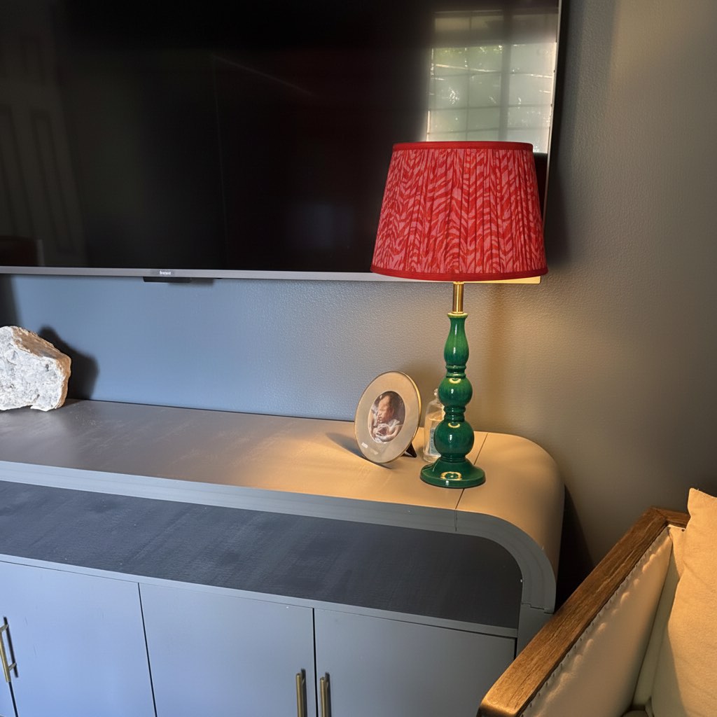 Customer photo of Grainora lamp glowing beside a bed