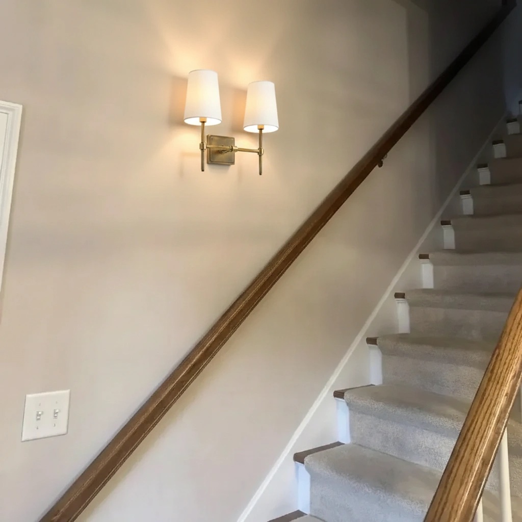 Customer stairway with Derlina wall lamp