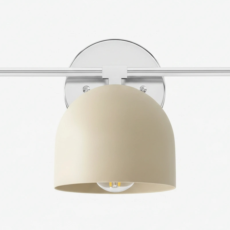 Close view of white dome shade and nickel arm