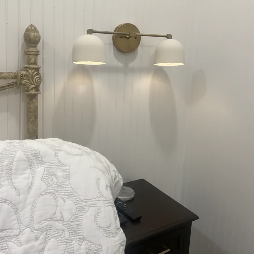 Customer bedroom with Metio wall lamp