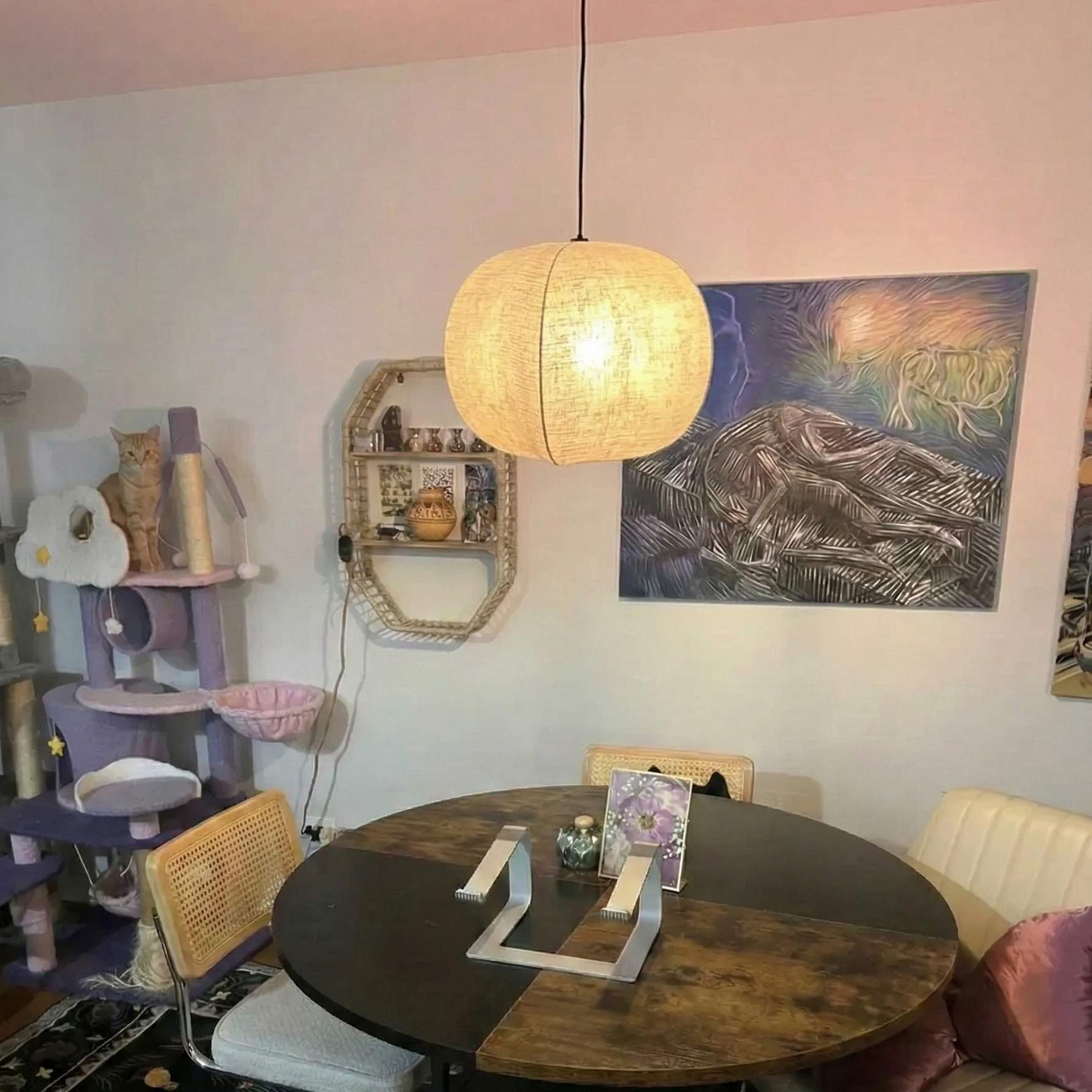 Customer review photo of Diora pendant over a table