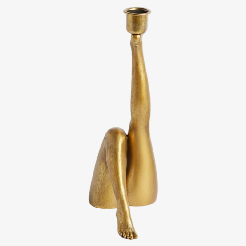 Gold bent-leg style variation of Kickra candle holder