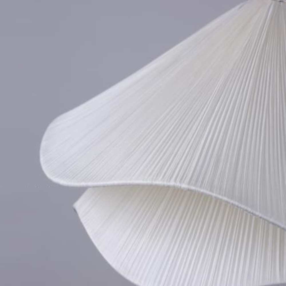 Close-up of the softly curved fabric petal shade