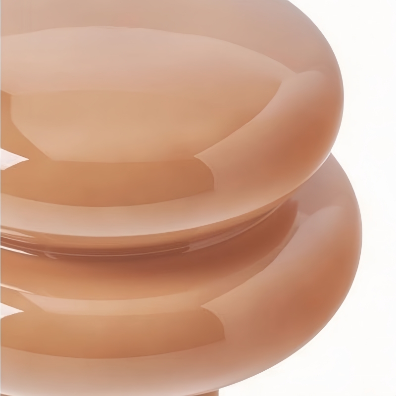 Close-up of pink opal glass lamp