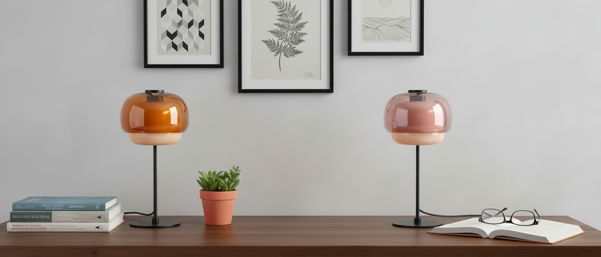 Clinco colored glass table lamps styled on a wooden desk