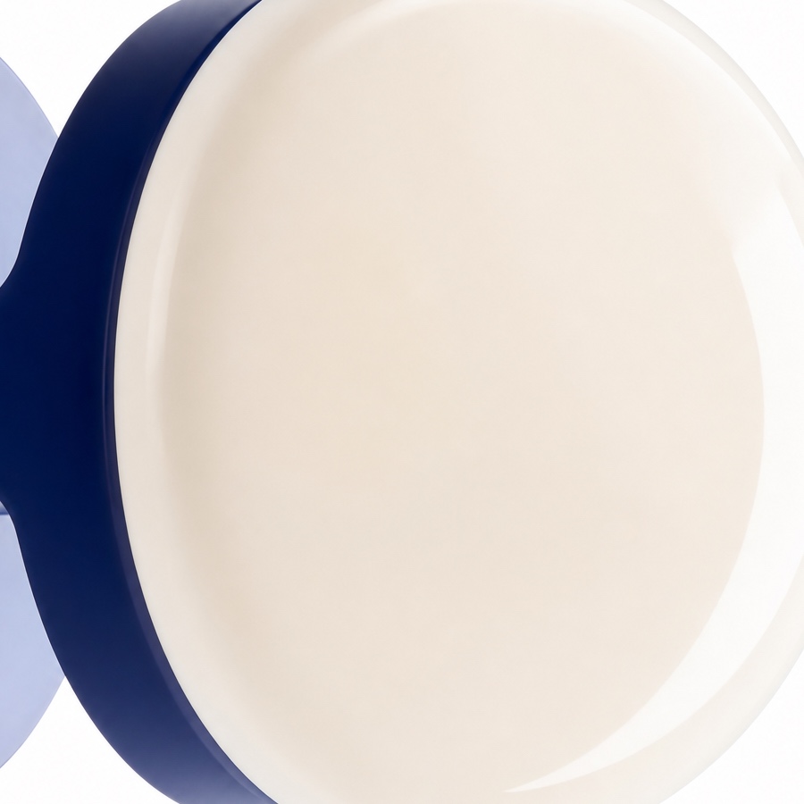 Close view of Nebulon wall light blue ceramic body and glass shade