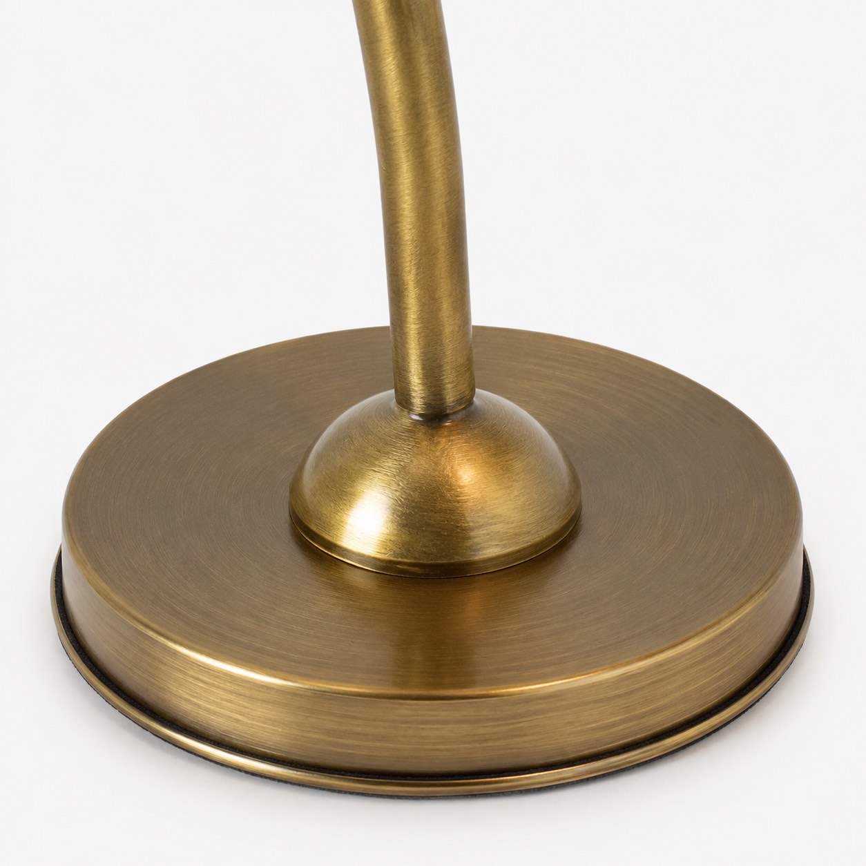 Close view of the warm metal lamp base