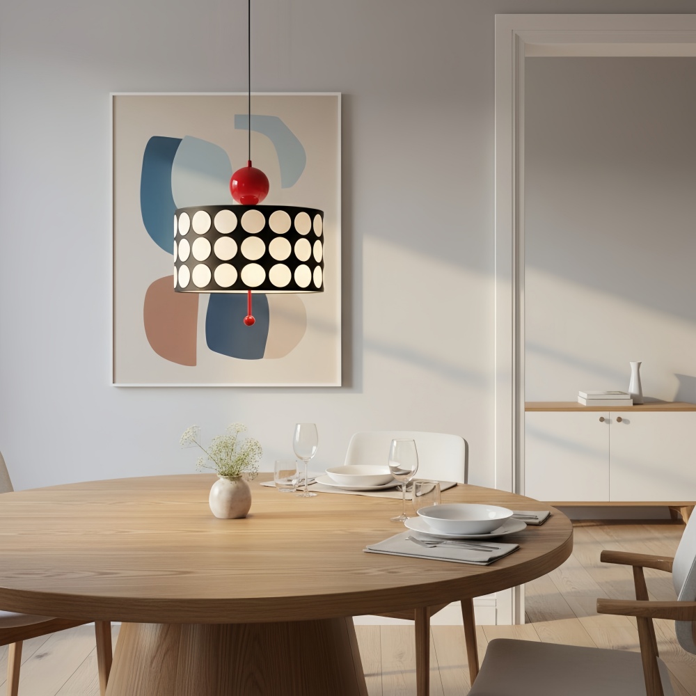 Dotrelia pendant light above a round dining table