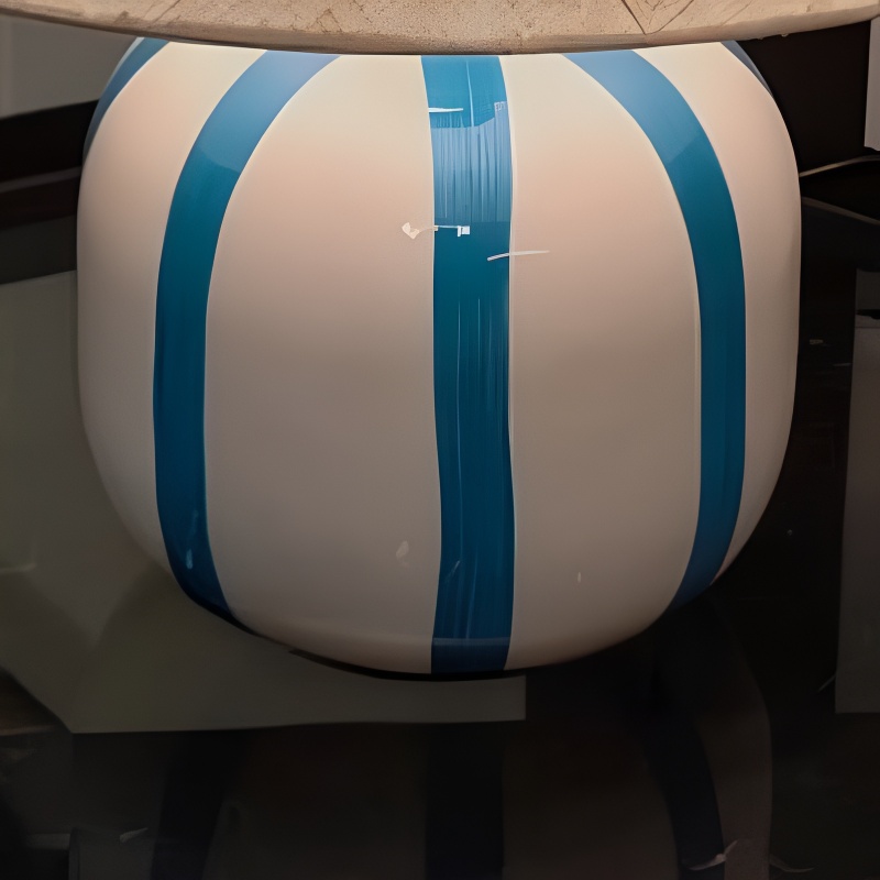 Close view of blue and white ceramic lamp base
