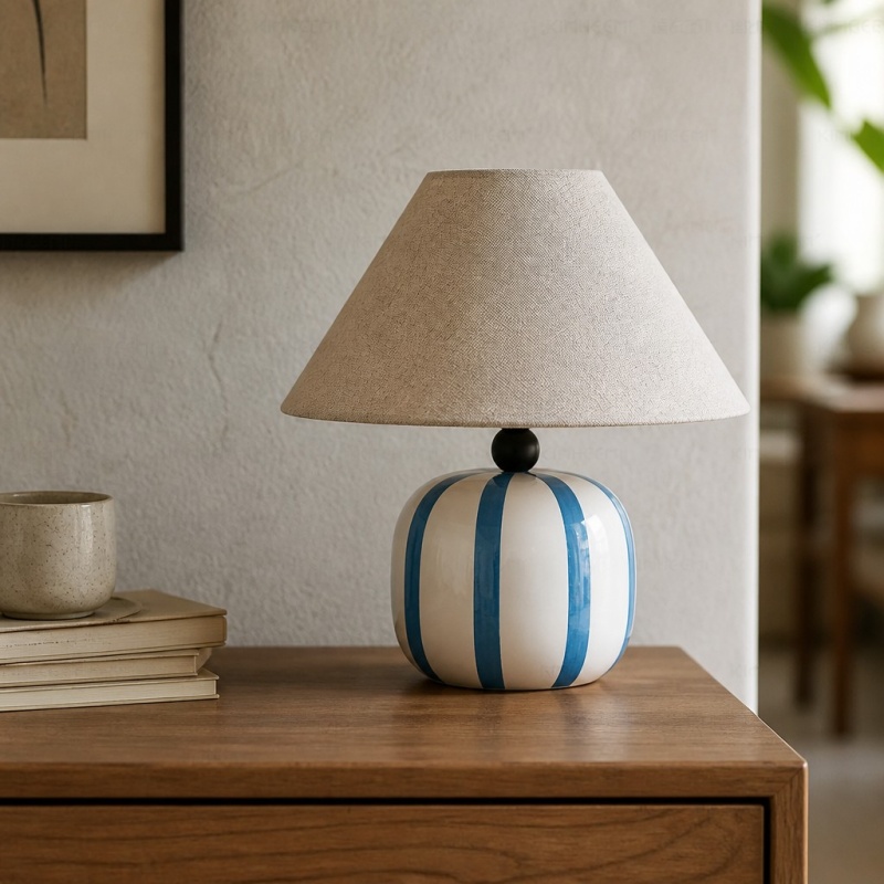 Ceruna table lamp on a wooden cabinet