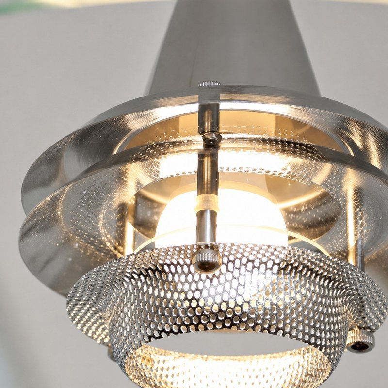 Close-up of the glowing glass diffuser and lamp underside