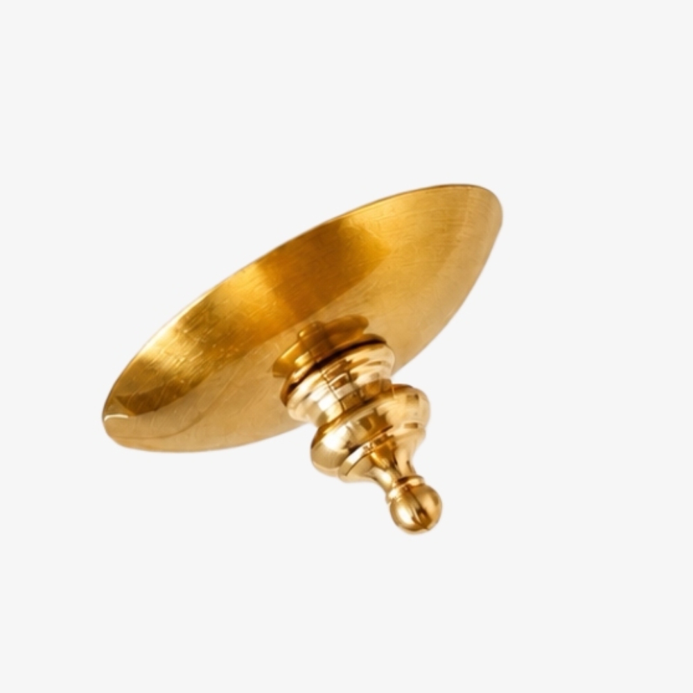 Close-up of brass canopy and finial detail
