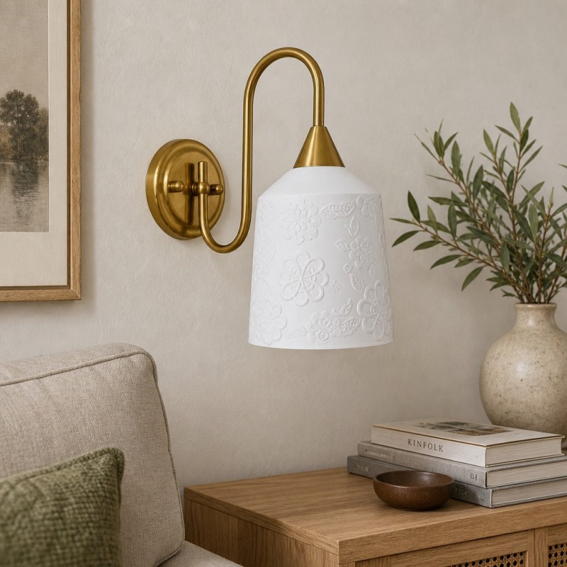 French vintage wall lamp near a bedside table