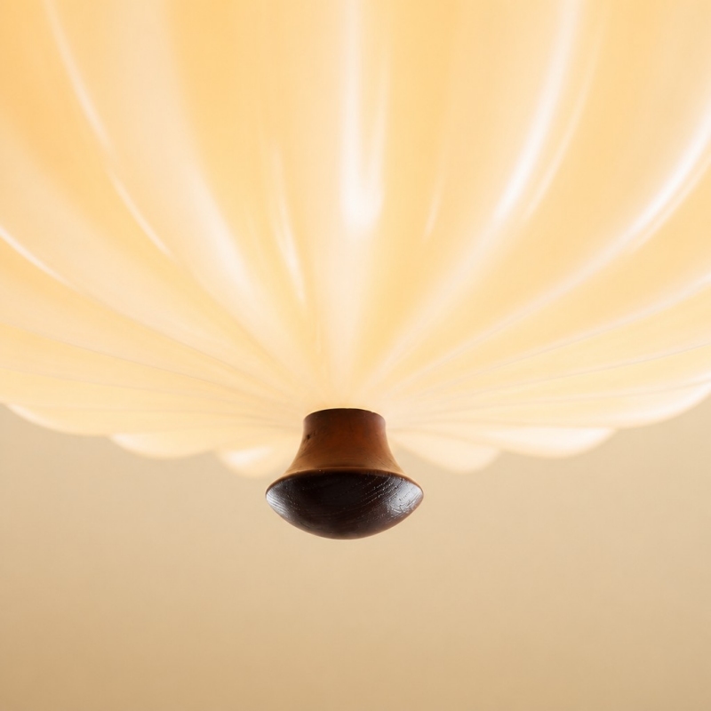 Close-up detail of the cream glass shade