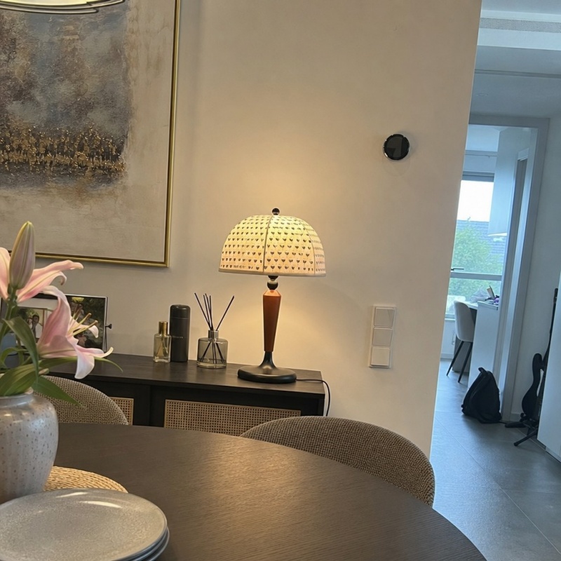 Customer photo of the Fennary table lamp lit in a room