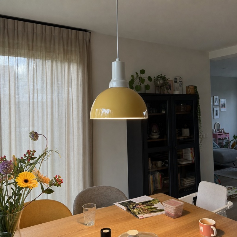 Customer home scene with Rummia pendant lamp and flowers