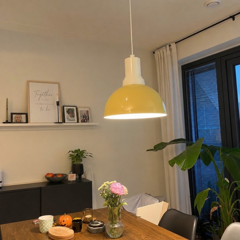Customer dining room styled with the Rummia yellow pendant lamp