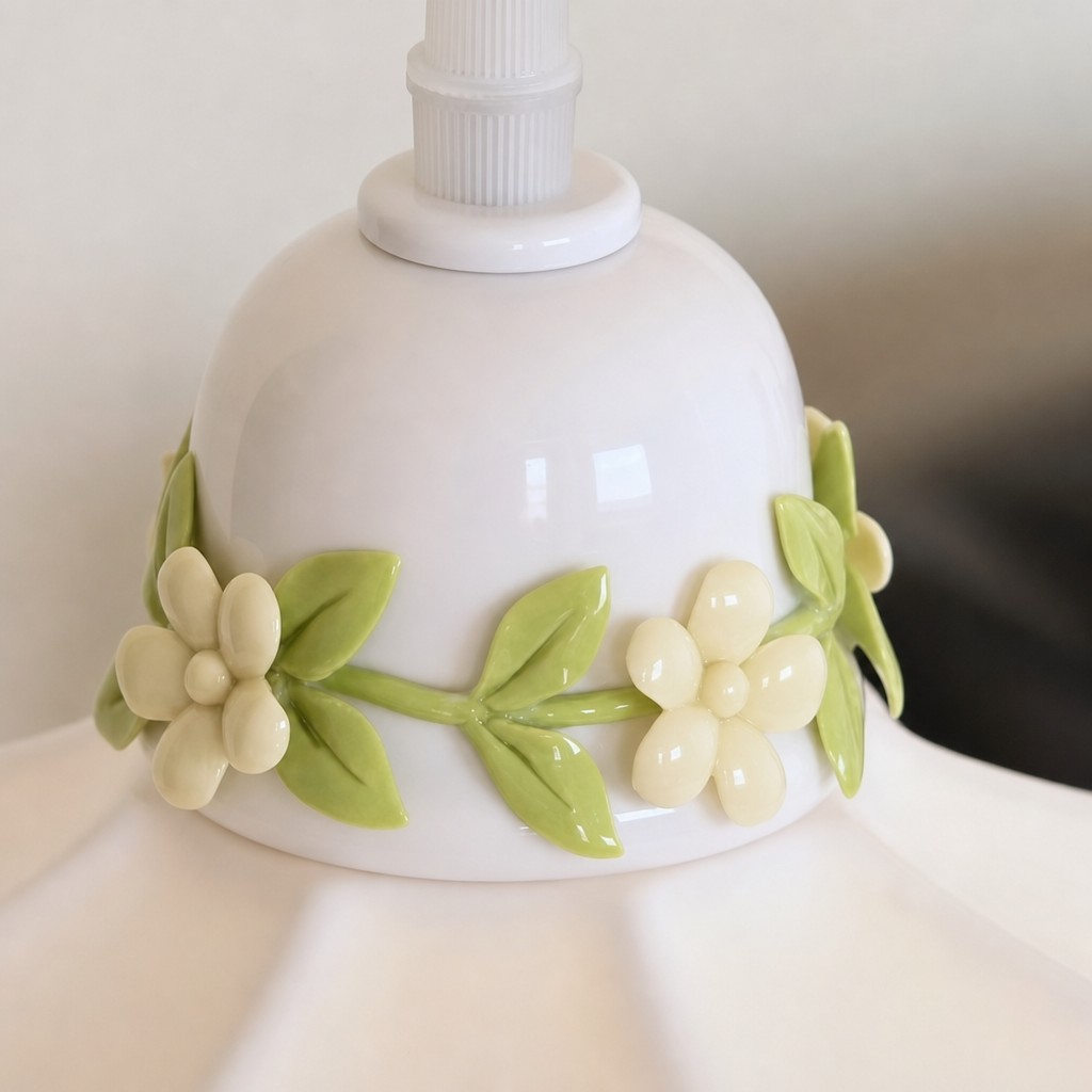 Ceramic flower detail on pendant lamp