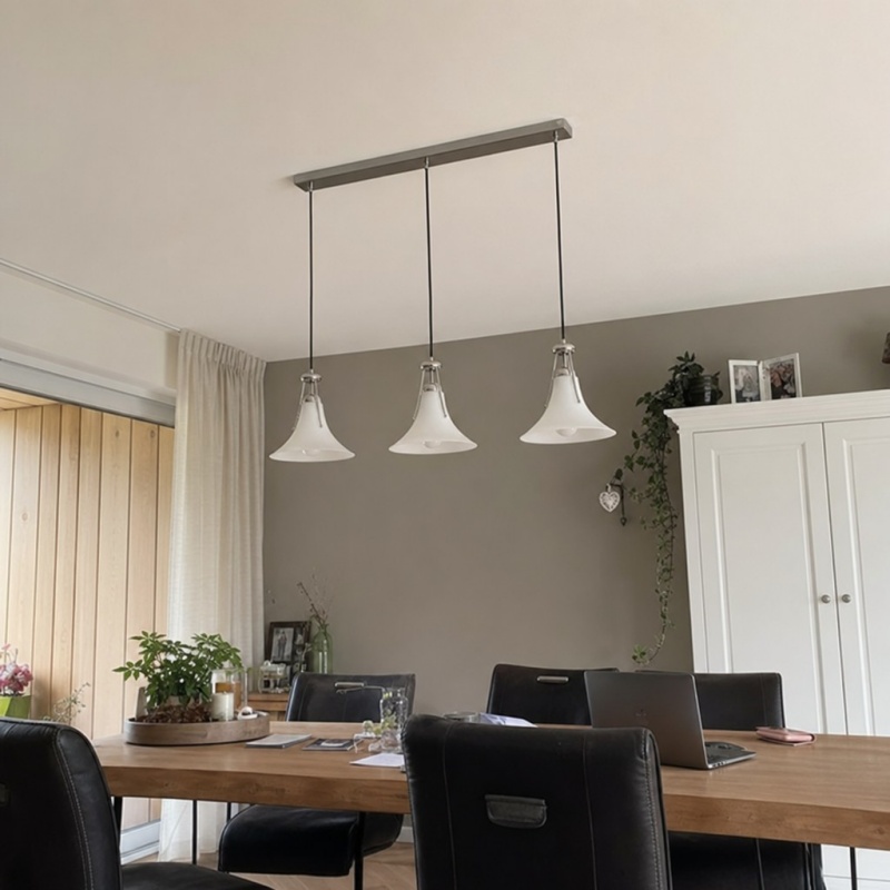 Customer photo of three Kallera pendant lights in a dining space