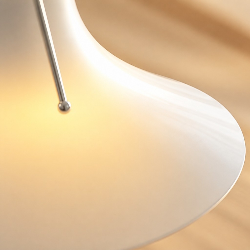 Close-up detail of the curved glass shade edge