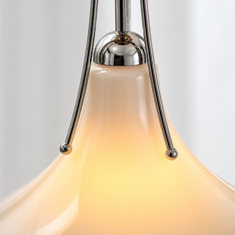 Close-up of Kallera pendant glass shade and chrome details