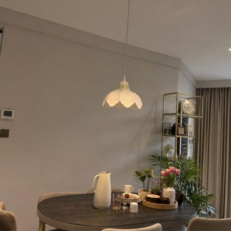Customer corner table with glowing pendant lamp