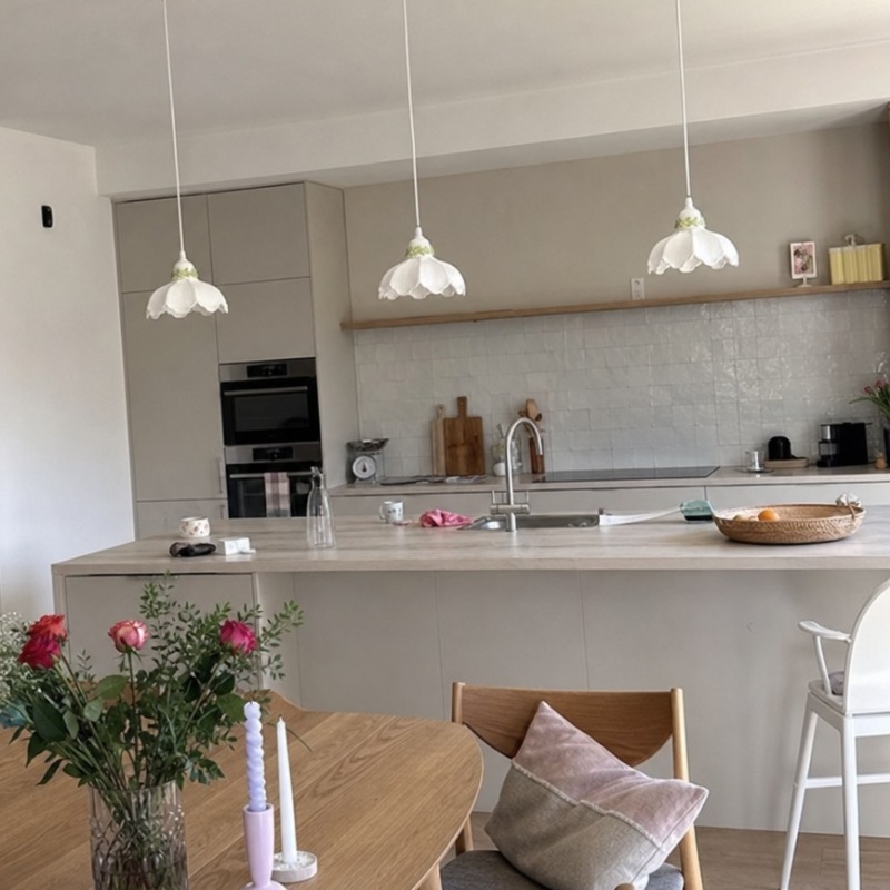 Customer kitchen with pendant lamps