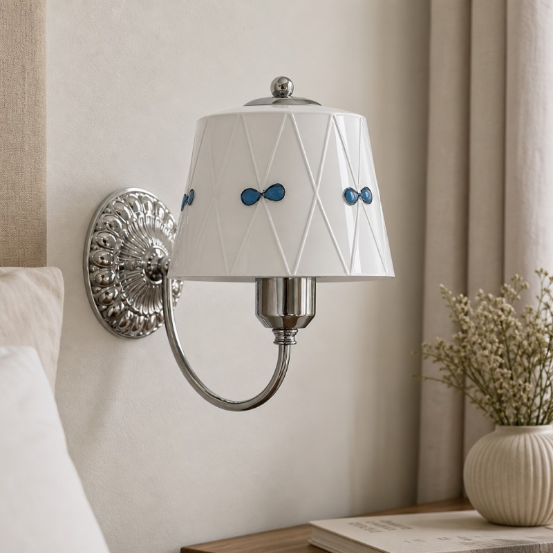 Billa wall lamp above a nightstand