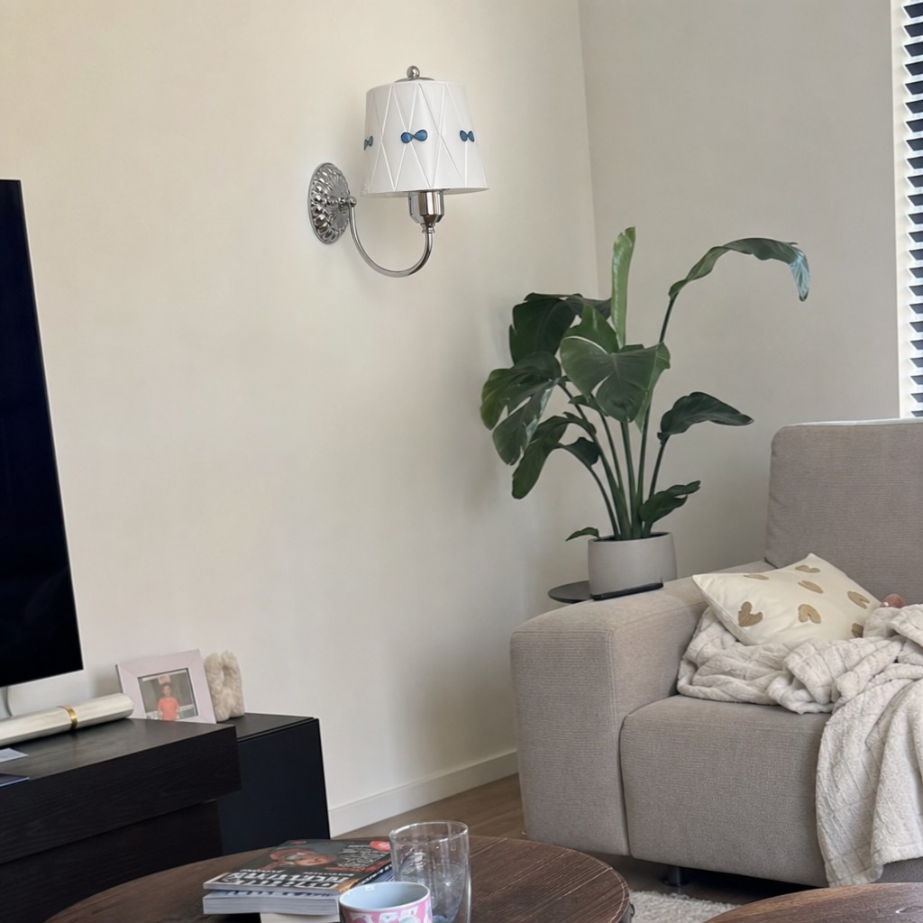Customer living area with Billa wall lamp