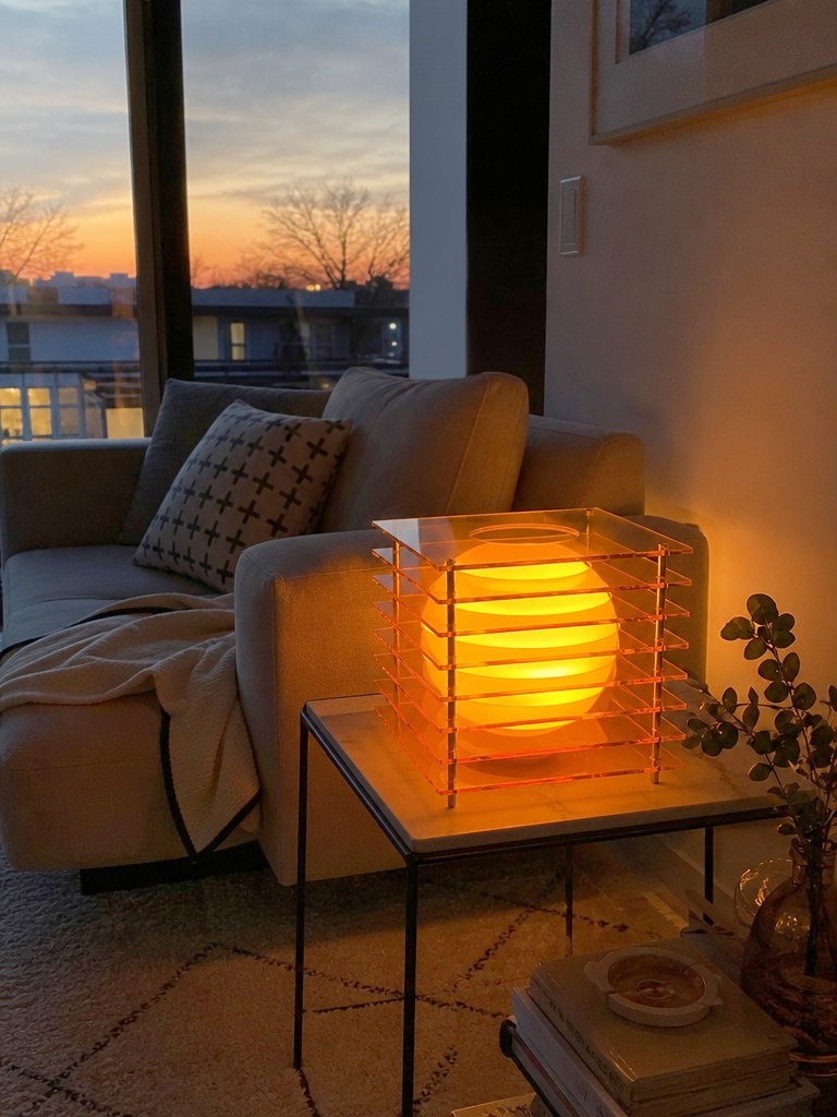 Afterglow wall lamp in a warm dining and living area