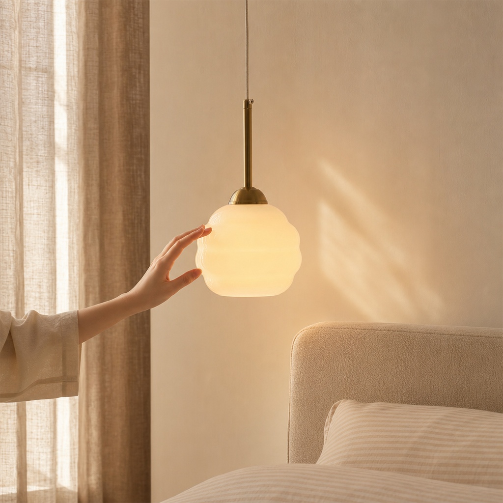 Warm Mallew pendant light beside a bedroom setting