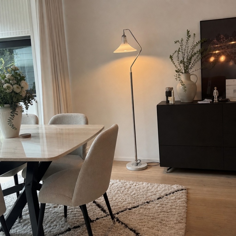 Customer room scene with Kallera floor lamp near dining area