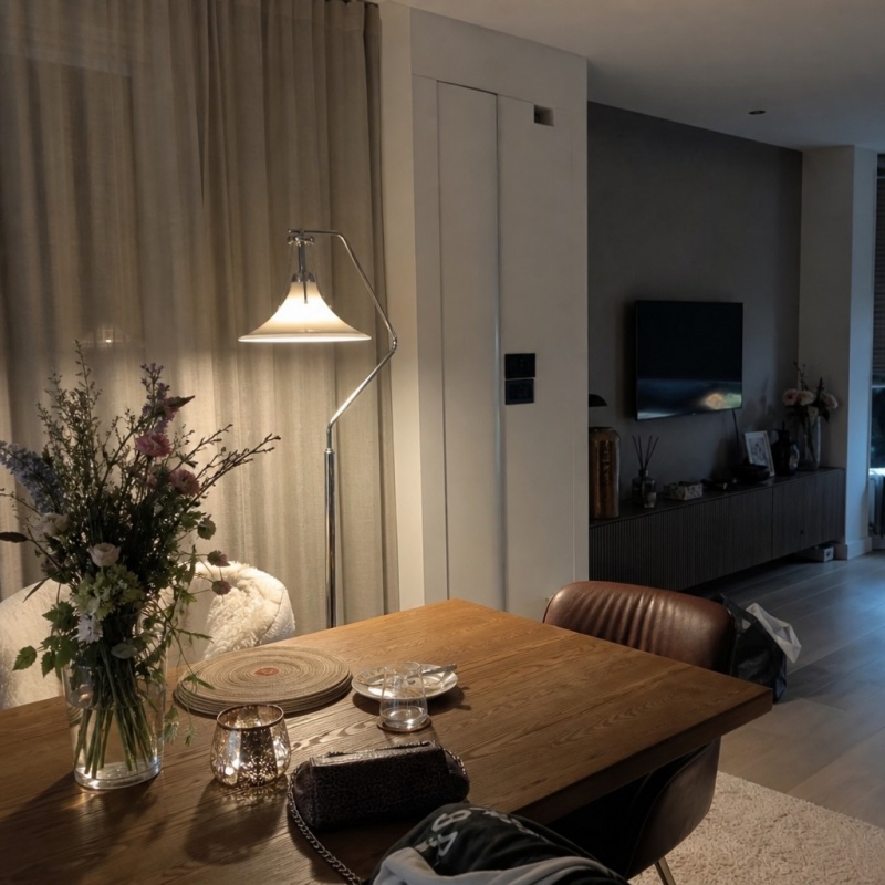 Customer room scene with Kallera floor lamp glowing at night