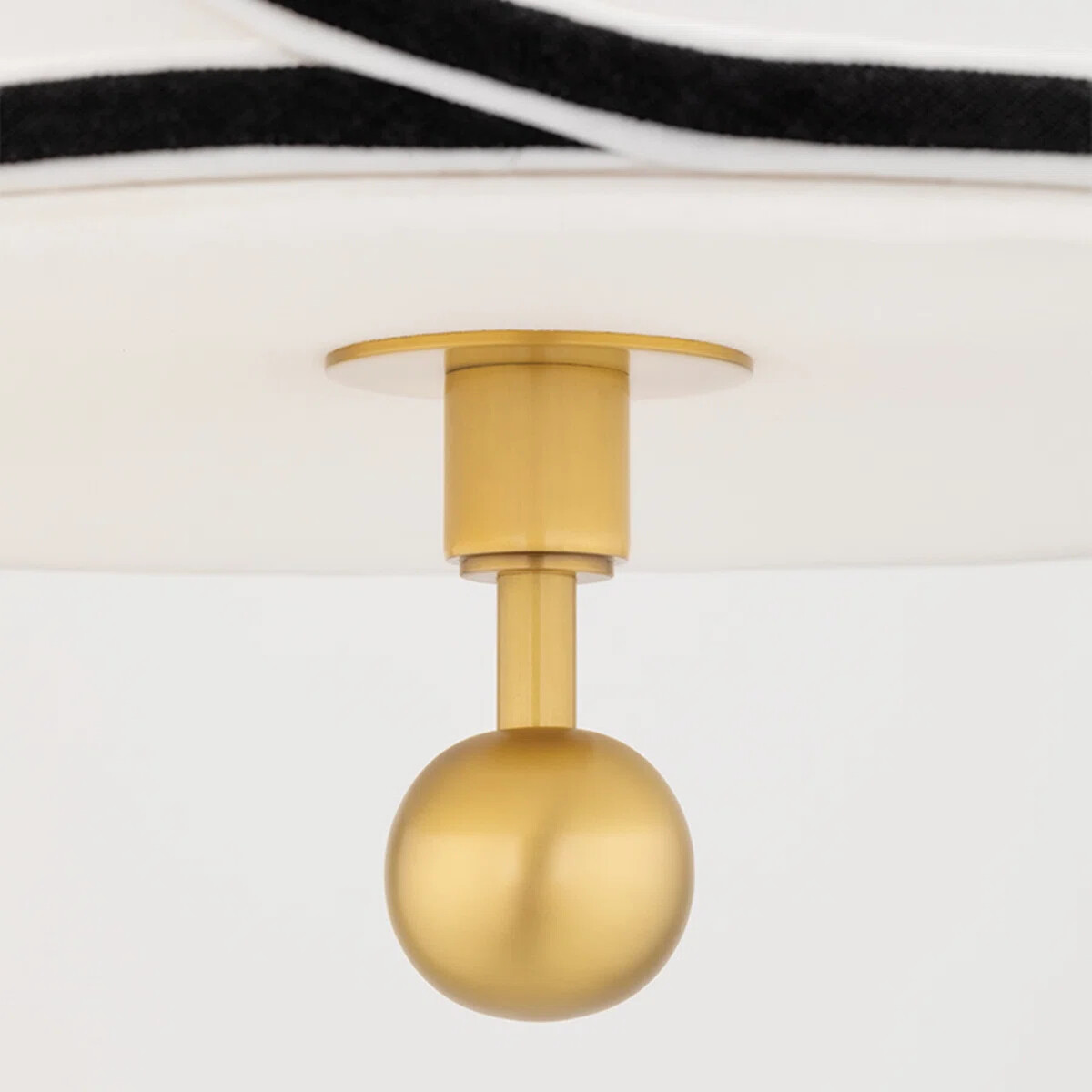 Close view of Roven pendant bottom metal sphere